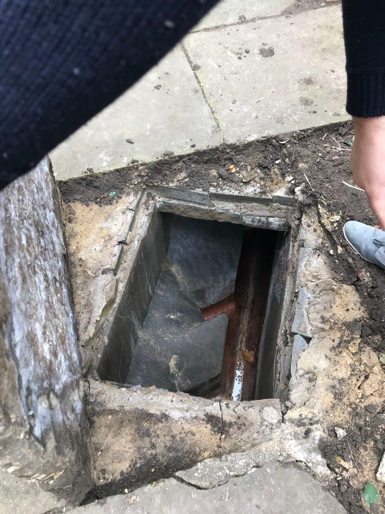 An inspection chamber opened up to clear a blockage