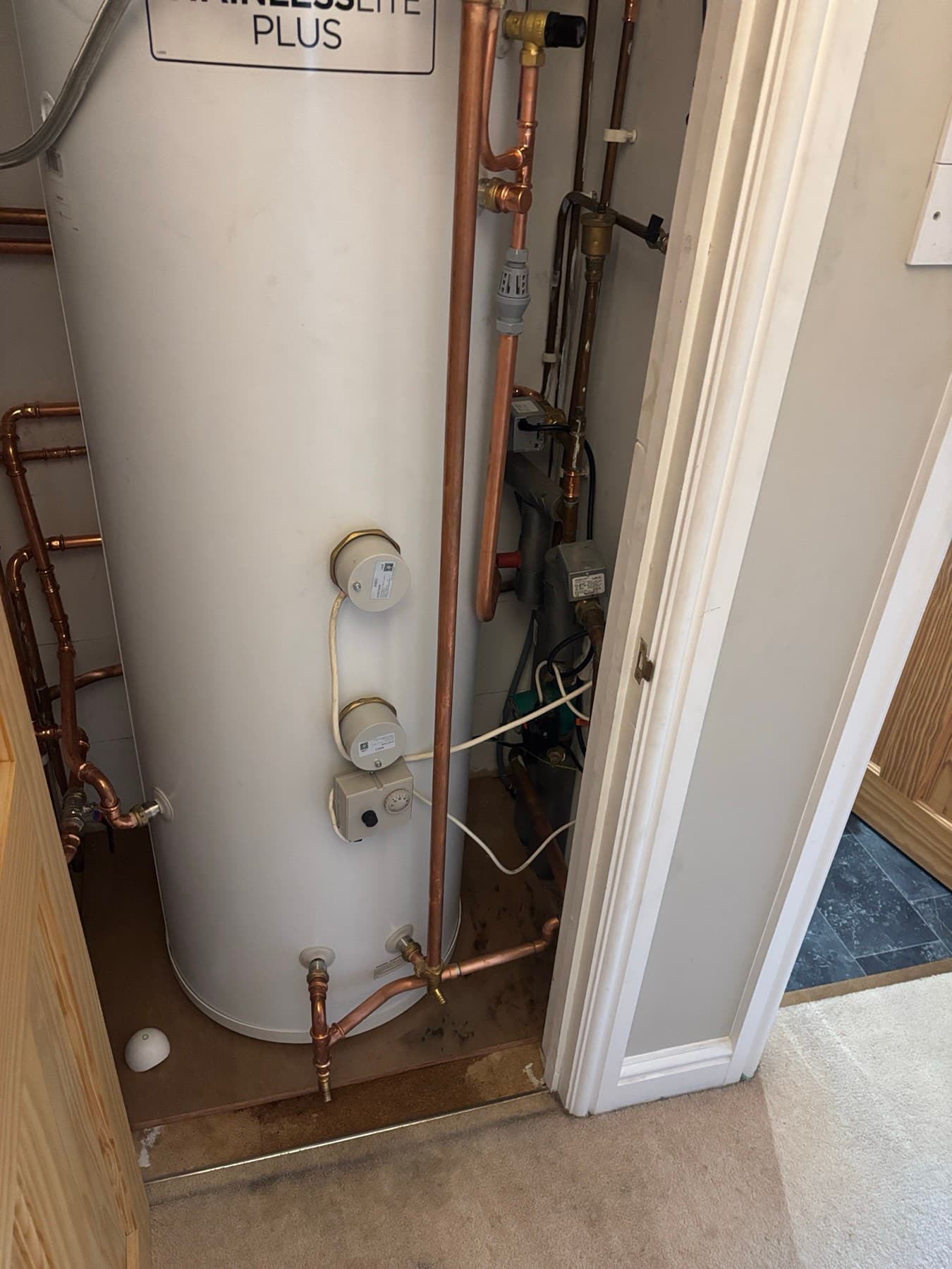 Redhill Stainless Lite Plus unvented cylinder in an airing cupboard
