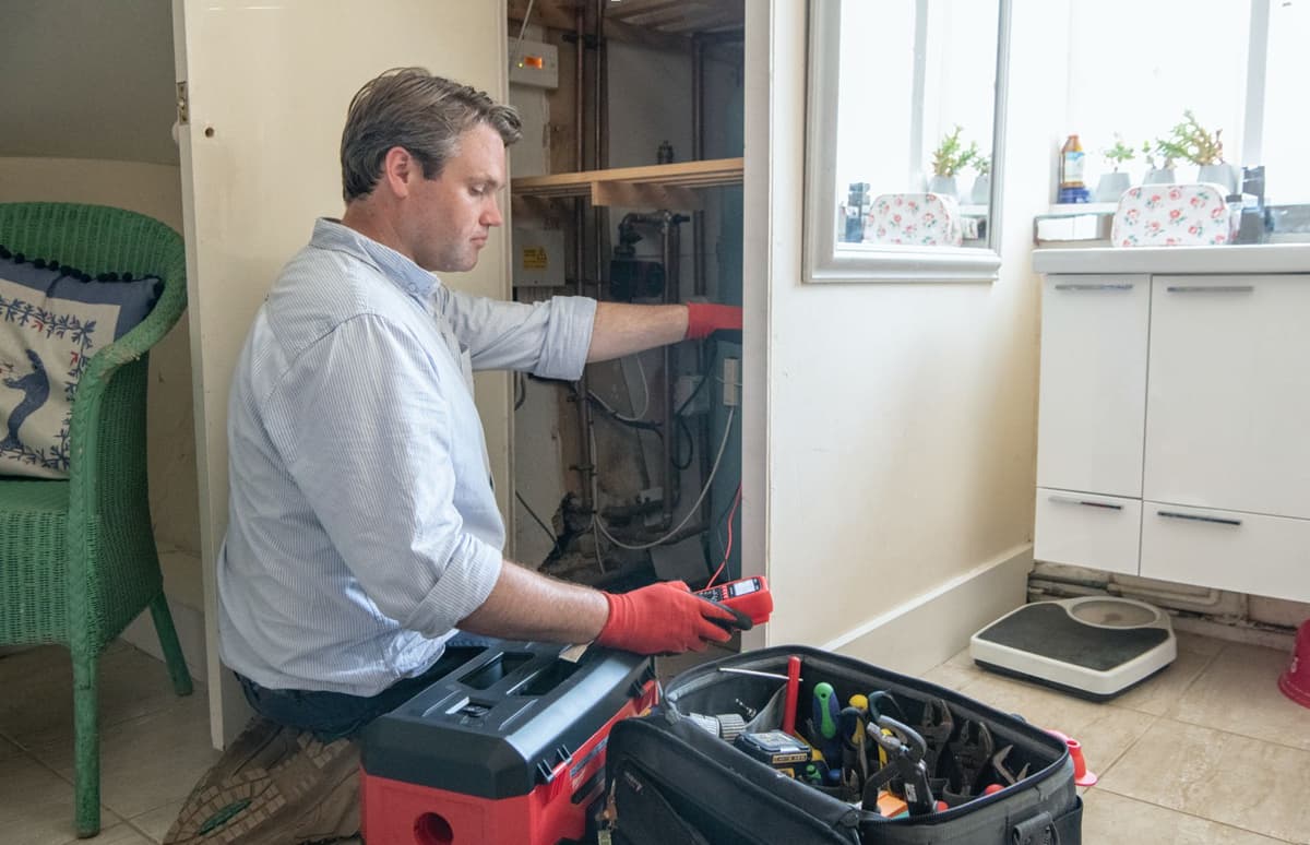 Will Gaze, owner operator, fixing plumbing with professional equipment - Rosebourne Plumbing maintenance work