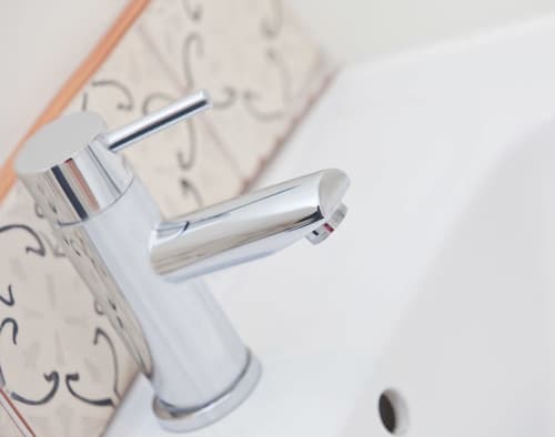 Basin Mixer on Patterned Tiling - Professional plumbing work by Rosebourne Plumbing