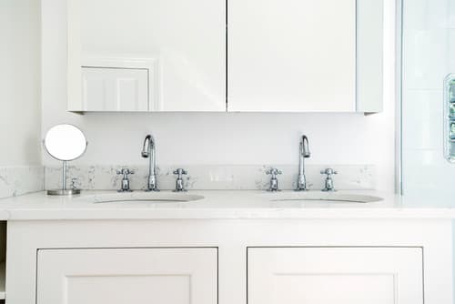 Twin Basins in a Marble Top - Professional plumbing work by Rosebourne Plumbing