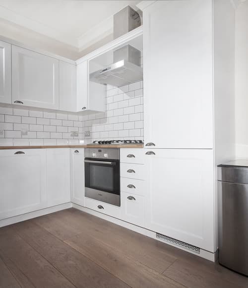 Metro-Tiled Kitchen with Hob and Oven - Professional plumbing work by Rosebourne Plumbing