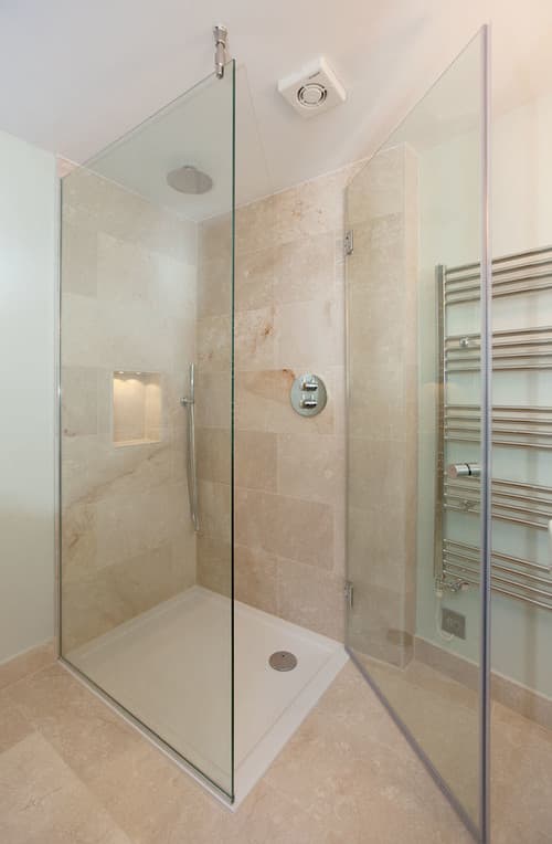 Walk-In Shower in Stone Tiling - Professional plumbing work by Rosebourne Plumbing