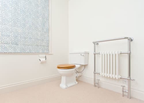 Traditional WC and Towel Warmer - Professional plumbing work by Rosebourne Plumbing