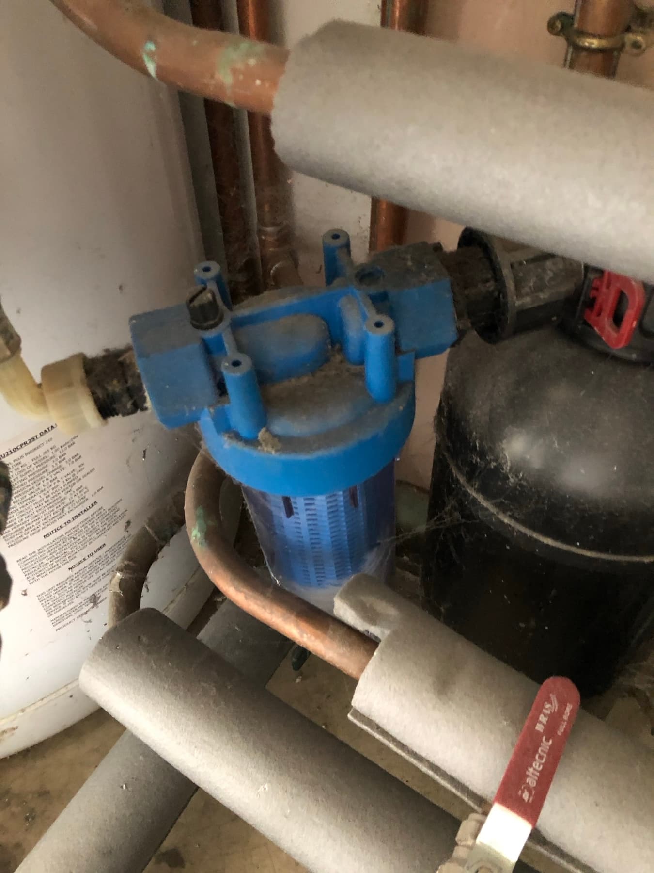 In-line water filter housing on the incoming main