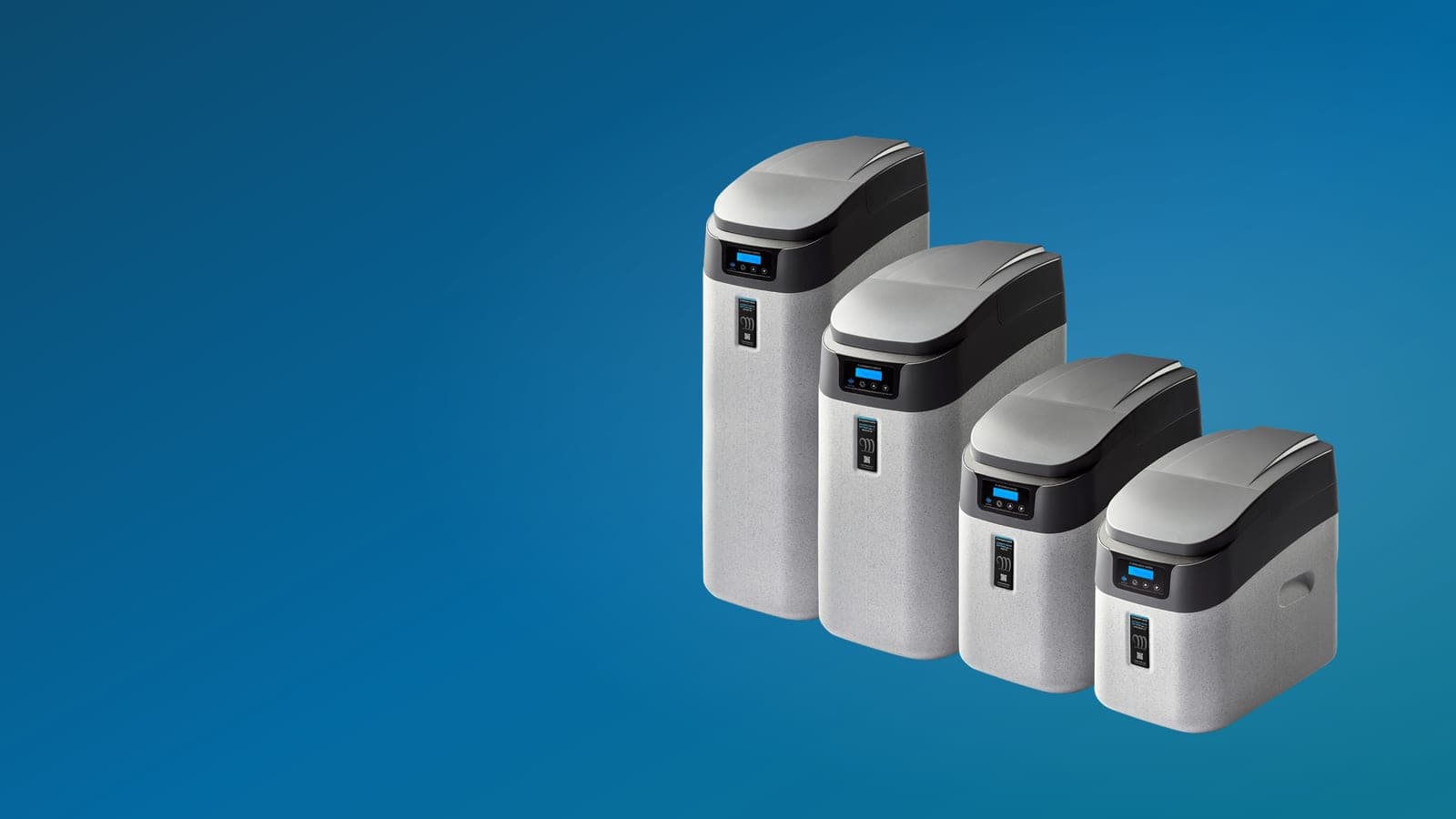 A range of Monarch salt water softeners in four sizes, from a compact under-sink unit to a full-height model