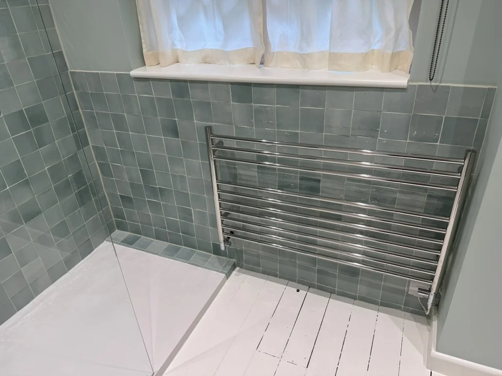 Hill End bathroom to shower room conversion showing modern fixtures and professional tiling work