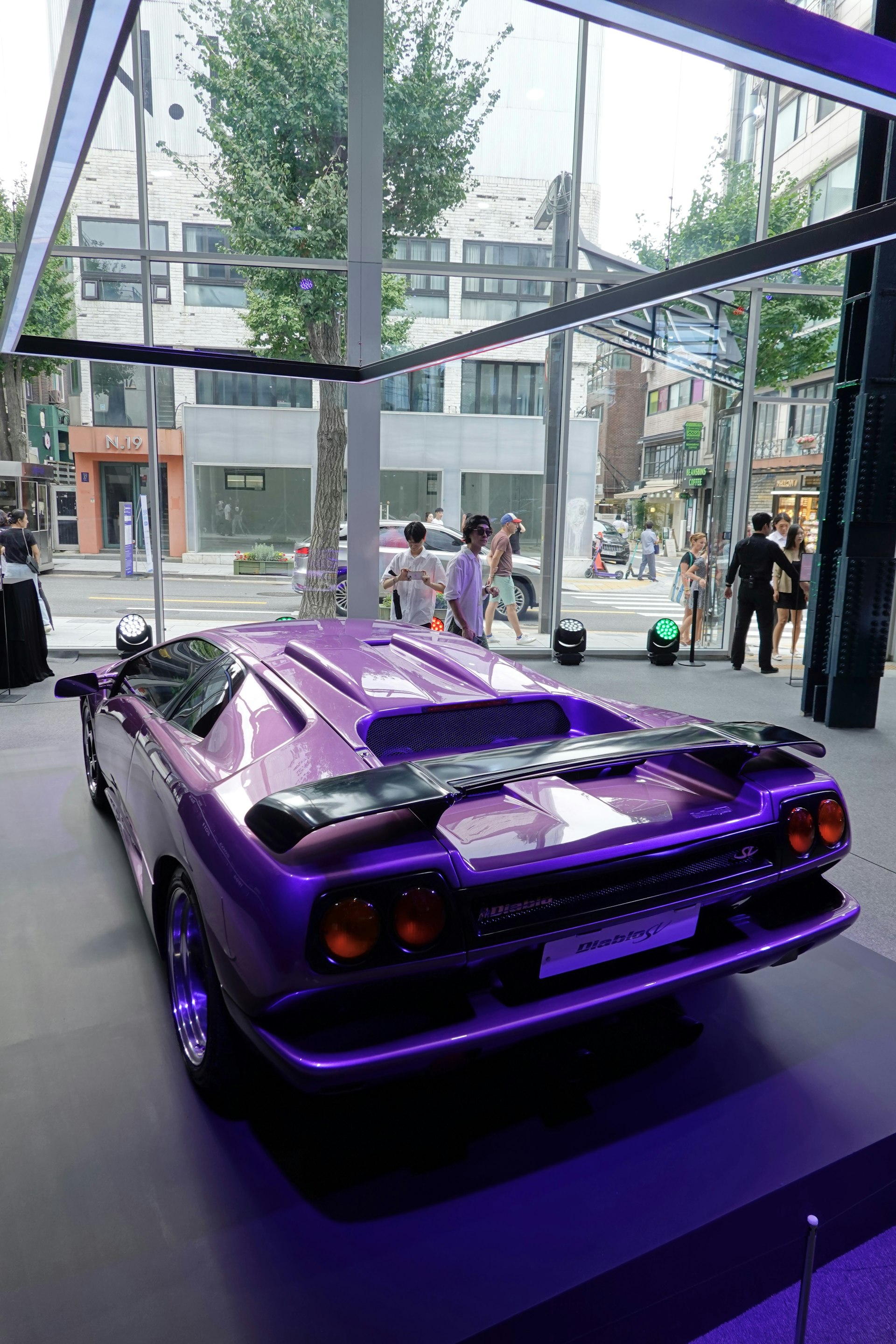 Car on display in showroom setting - dramatic vehicle presentation
