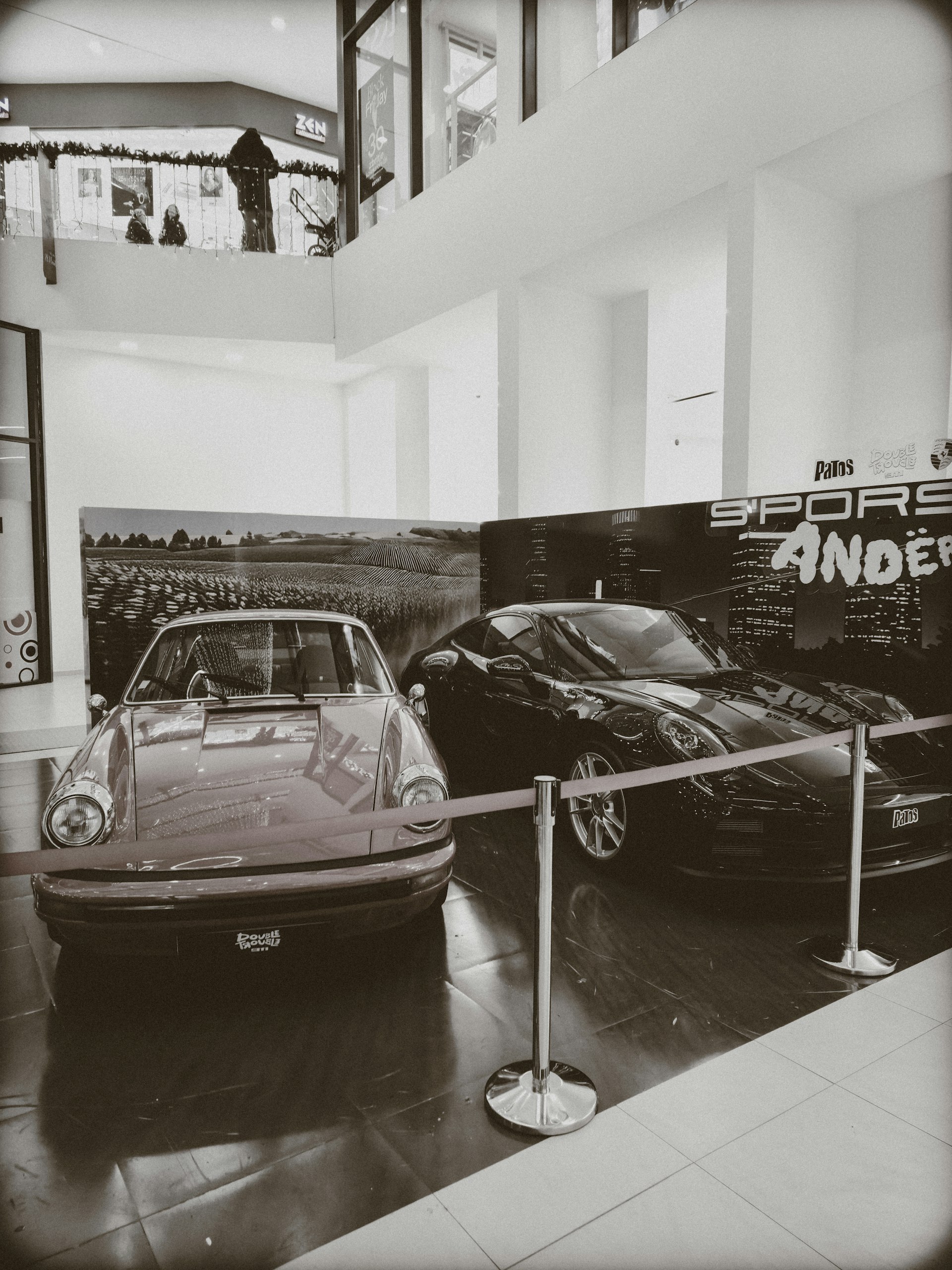 Vehicles displayed in showroom-style garage - inspiration for professional storage