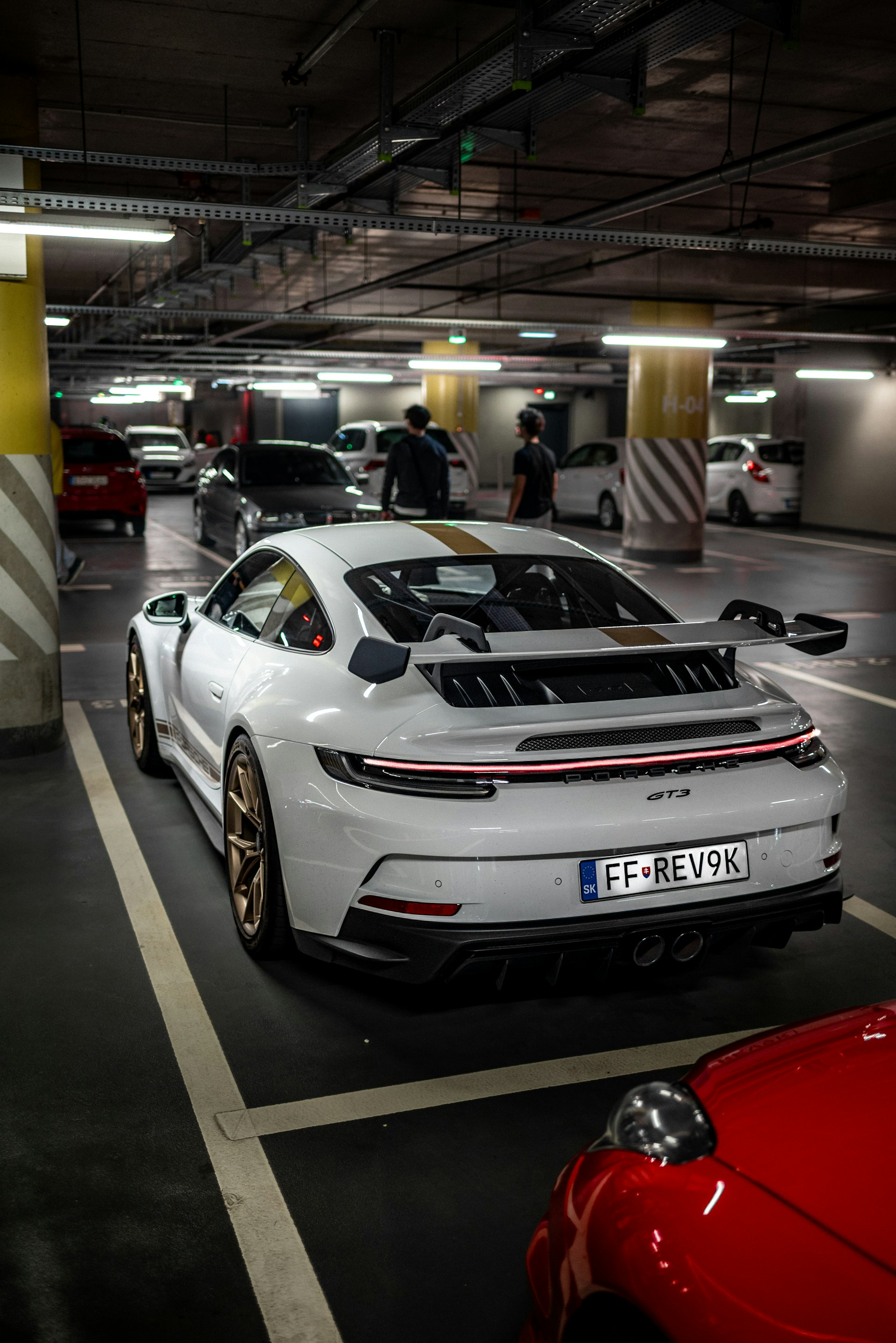 Porsche in clean garage space - professional vehicle storage