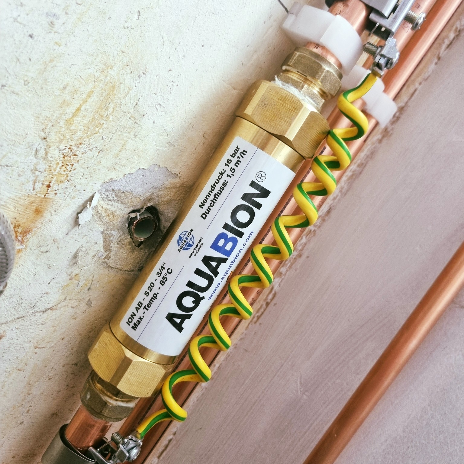 Will Gaze installing Aquabion water conditioner - German engineering for hard water Hampshire